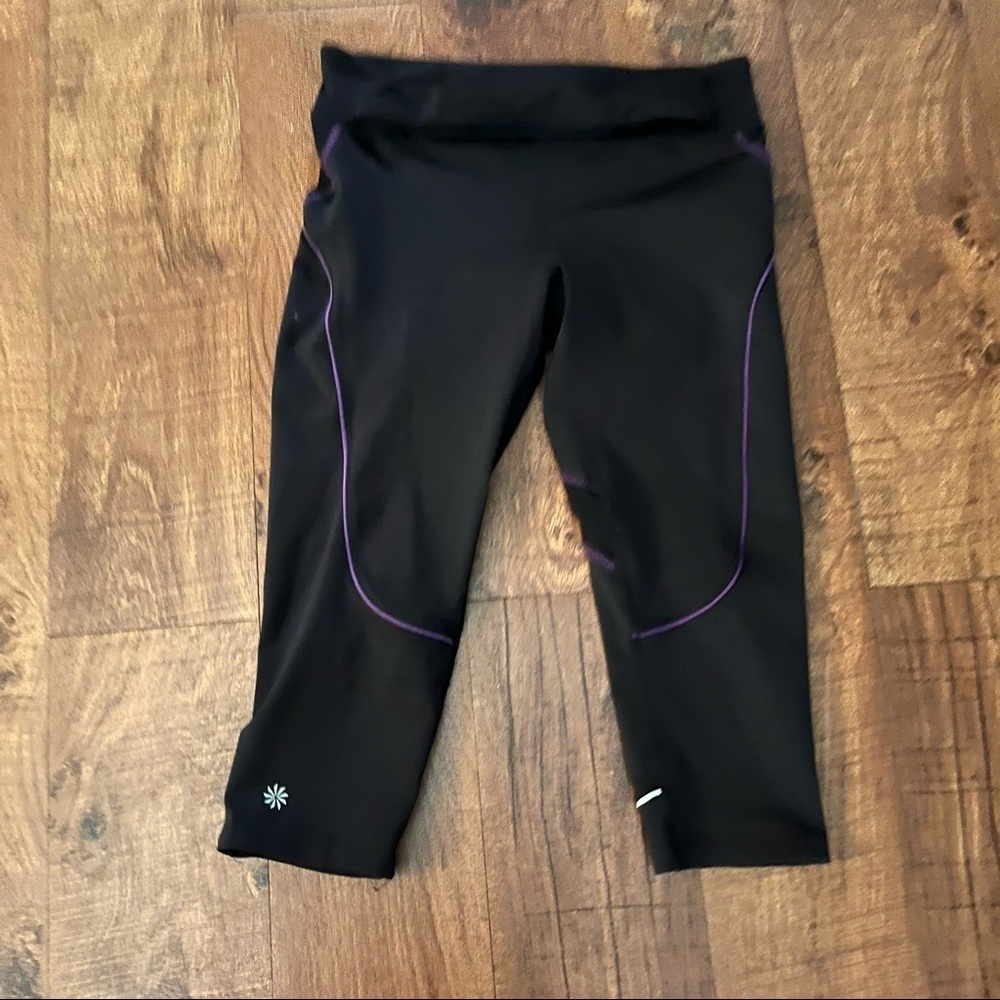 Athleta Womens cropped leggings Sz small black purple zipper pocket drawcord